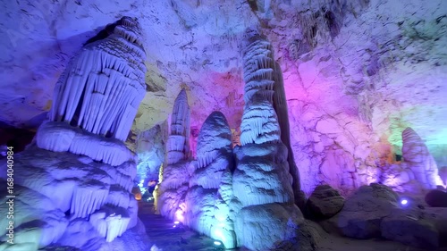 Mystical illuminated karst cave formations, exploring an underground world of geological wonders