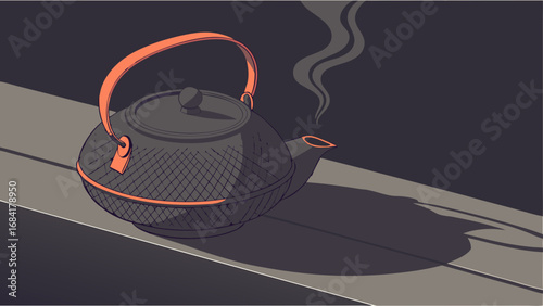 A black tea kettle with orange handle on a surface.