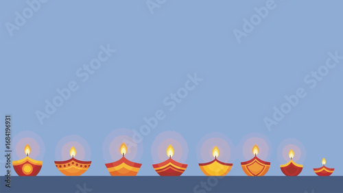 Diwali diya decorations with traditional oil lamps and glowing flames casting a warm, festive ambiance on a blue background, celebrating the festival of lights