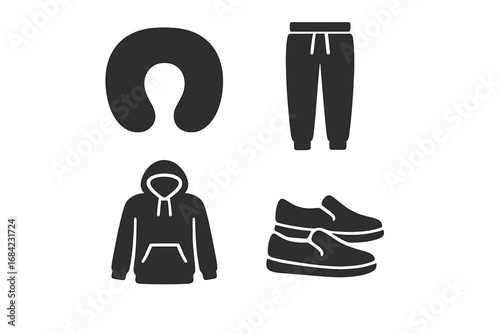Travel comfort essentials icon set. Solid glyph icons of neck pillow, joggers, hoodie, and slip-on shoes. Vector illustration for comfortable journey and flight apparel.
