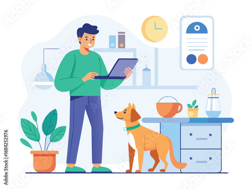 Man feeding dog while working on laptop at home kitchen
