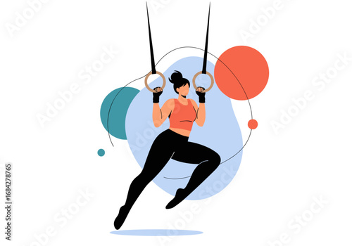 Athletic woman performing an impressive gymnastic routine while suspended by rings