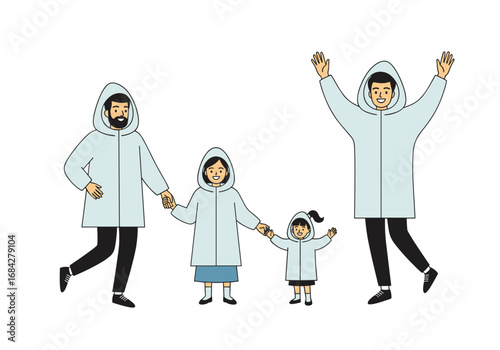 A cheerful family wearing warm winter coats enjoys the cold weather outdoors together