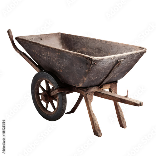 Rustic wooden wheelbarrow on black background displaying vintage farm equipment
