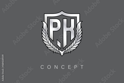 PK Creative Initial Letter Logo with Shield and Laurel Wreath Silver Metallic Branding Emblem on Gray Background.