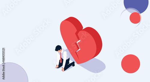 Devastated businessman kneels before a giant broken heart symbol representing failure or loss.