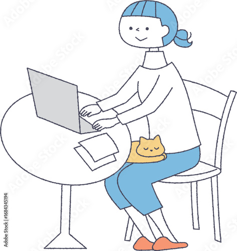 膝に猫を乗せてパソコンを使う女性