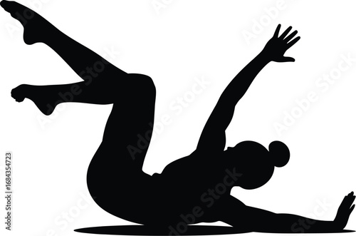 Silhouette of person stretching arms and legs yoga