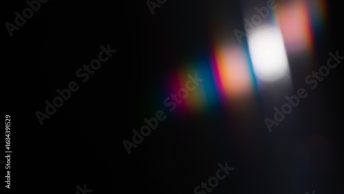 light leak overlay effect with colorful light leaks,retro grain noisy film distressed texture light leak flare on black background,old film projector,abstract background with rainbow light