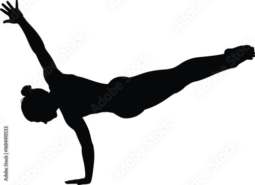 Silhouette of a woman performing a yoga pose balance