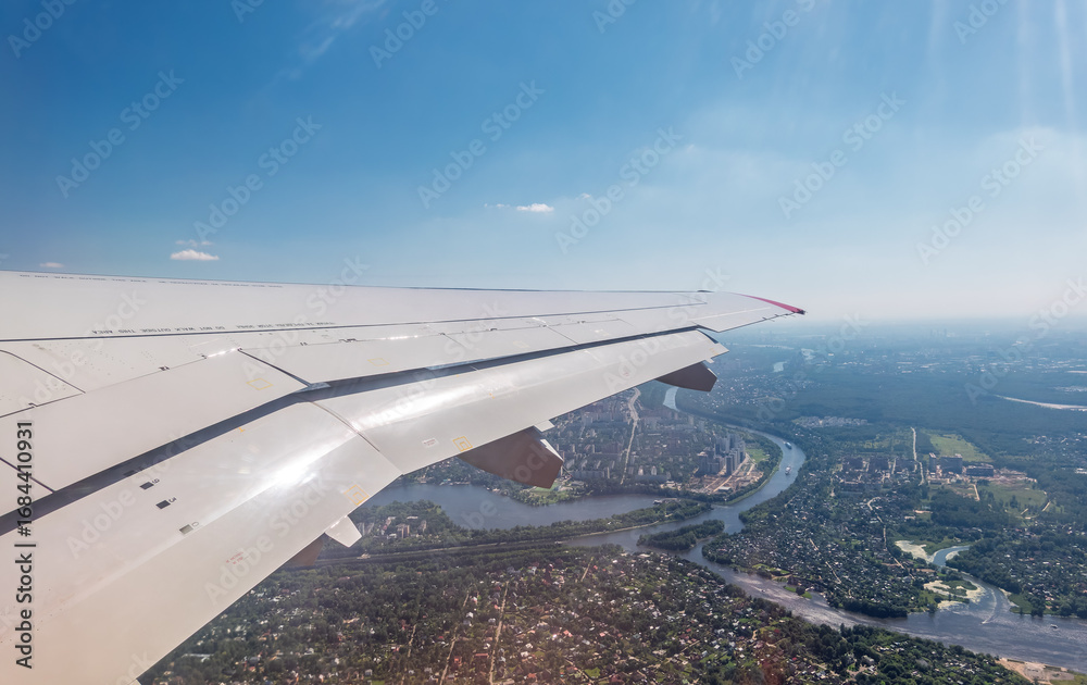 Obraz premium View from the airplane window during takeoff at Sheremetyevo airport at summer
