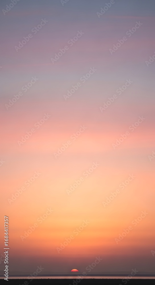 Fototapeta premium Peaceful sunset hues blending over a serene landscape scenery
