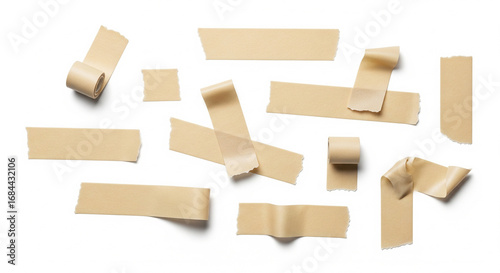 Various pieces of brown masking tape arranged, showing adhesive strips for crafting and utility on an isolated transparent background.