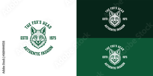 A vintage fashion brand logo featuring a classic forward-facing fox head. The design is encircled by text that includes the brand name, ESTD 1975, and AUTHENTIC FASHION.