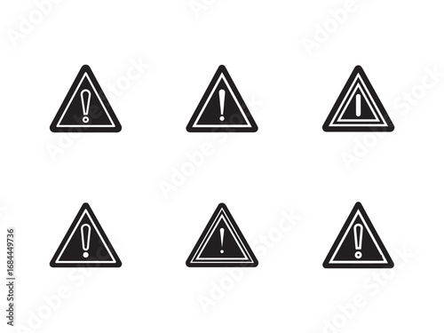 Collection of Black and White Warning Symbols in Triangle Shapes on a Clean Background Representing Hazard and Caution
