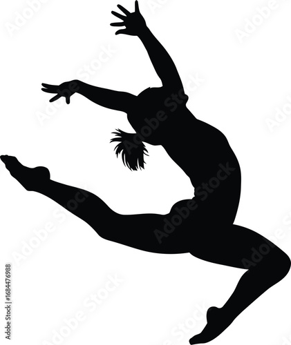 Silhouette of a dancer in mid leap leaping graceful