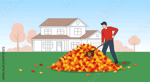 Man Raking a Large Pile of Autumn Leaves in Front of a House