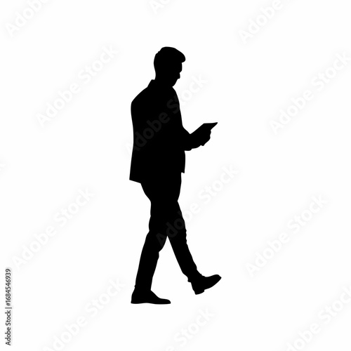 Silhouette of a businessman using a tablet to check smart city updates