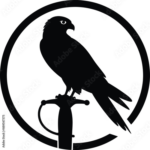 Majestic falcon perched on ornate sword hilt silhouette