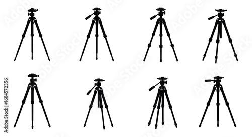 eight tripods arranged neatly in two rows for photography