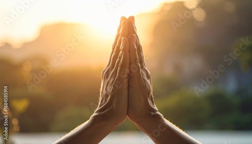 Golden Hour Serenity: Hands in Prayer