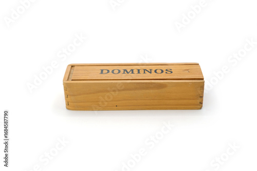 wooden box with the word “Domino” written on it, isolated on a clean white background