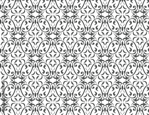 Classic damask pattern of interwoven foliage and decorative teardrop forms.