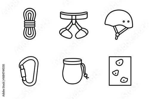 Essential rock climbing gear collection: rope, harness, helmet, carabiner, chalk bag, wall