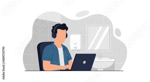 Young man in headphones focused on his laptop, working from an unexpected bathroom setting. Modern remote work and flexible lifestyle.