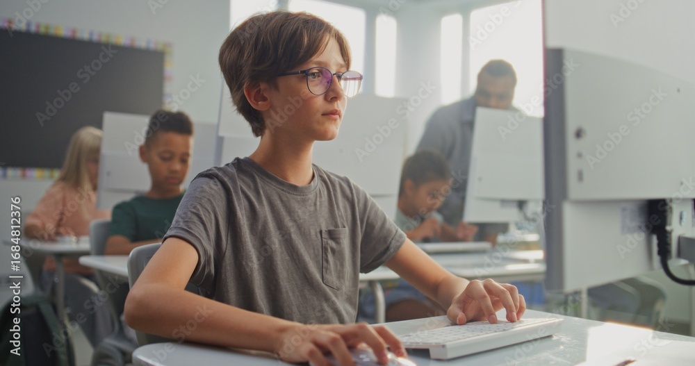 Obraz premium Smart Young Boy Using Computer, Doing Creative 3D Design Project. Elementary School Children Learning Coding During Digital Programming Lesson. Interactive and Innovative STEM Education. Close Up.