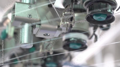 Textile fabric. Closeup yarns. Spinning Machine Textile Industry. close up spinning Machine. Yarn Spools