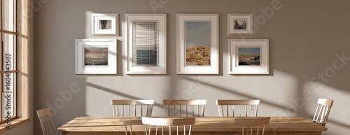 Pictures in white frames on a light beige wall in a dining room.