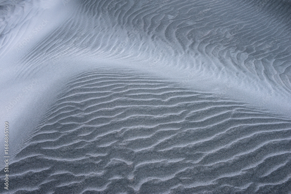 Sand ripples and textures at Wharariki Beach New Zealand Sand ripples and textures at Wharariki Beach New Zealand