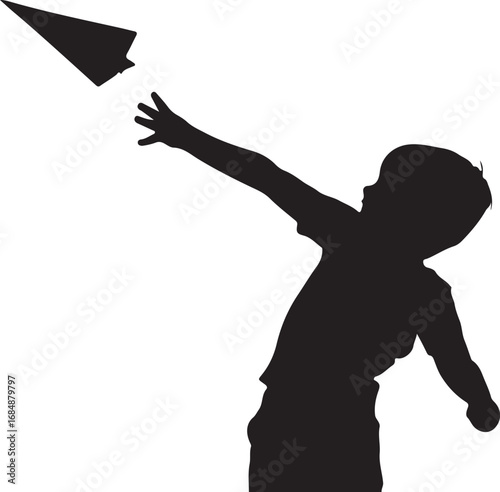 Black silhouette of a young boy reaching for a paper airplane child