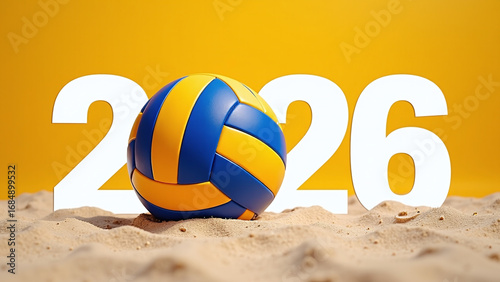 Blue-yellow volleyball pops before bold 2026 on sandy yellow.  
