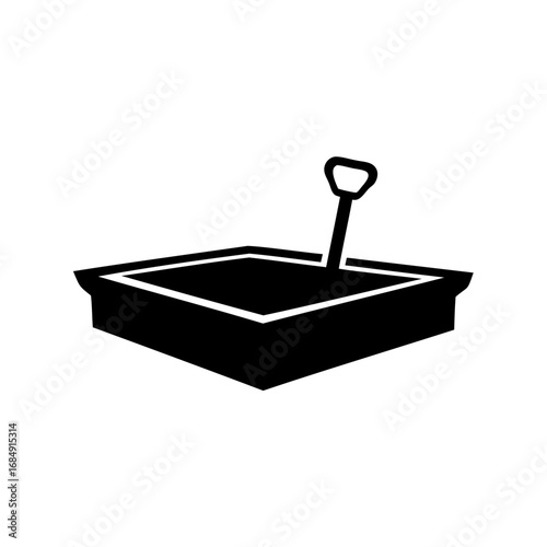 Children's play area featuring a black sandbox with a shovel inside, isometric view