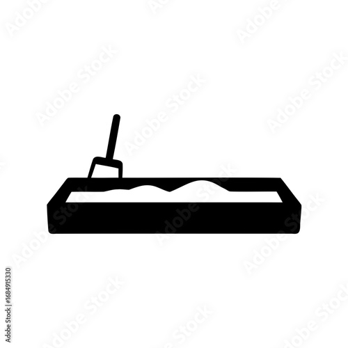 Black silhouette illustration of a cat litter box with scoop and litter