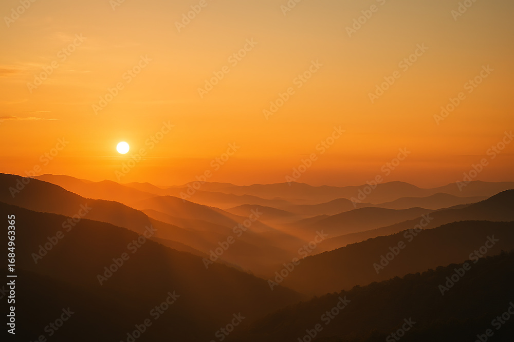 Fototapeta premium Golden Sunrise Over the Smoky Mountains: A Layered Landscape of Tranquility.
