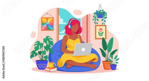 Woman with headphones working comfortably on laptop at home, surrounded by plants and art. Represents remote work, online learning, or modern digital lifestyle.