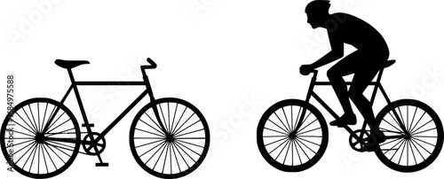 Two bicycles side by side one stationary and one with a cyclist silhouette
