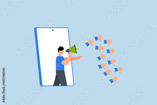 Internet hater, angry young man using megaphone while shouting from mobile phone with negative thumbs down icons