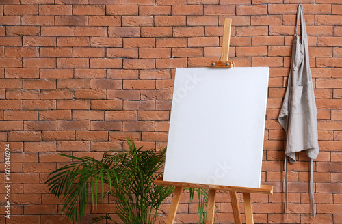 Wooden easel with blank can...