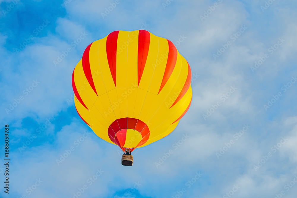 Fototapeta premium Hot air balloon is just relieved, and later ready for landing