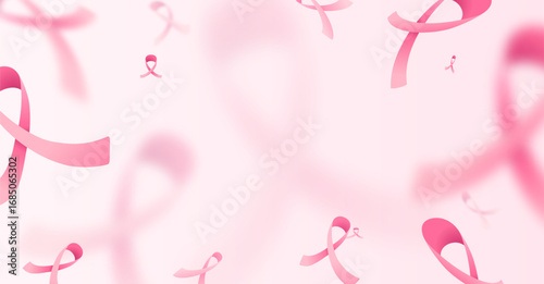 Breast cancer awareness month vector banner background. Blur and focus pink ribbons on light backdrop