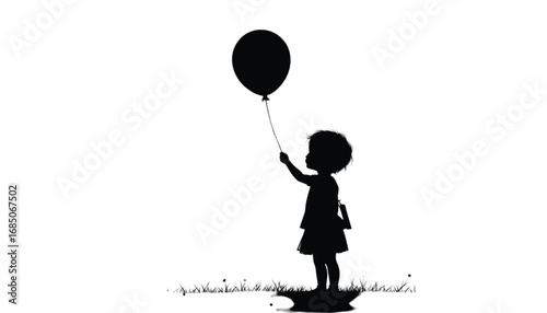 A sweet silhouette of a small child, facing away, holding a balloon that floats above.
