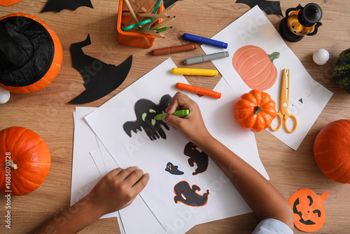 Teenage boy drawing Hallowe...