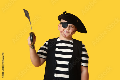 Cute happy boy with sword d...