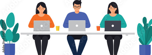 Three people working on laptops at a long table with plants