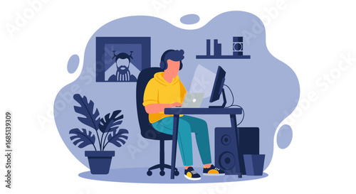 Focused young man in headphones working remotely at his desk with a laptop and monitor. Ideal for concepts of productivity, digital learning, and modern lifestyle.