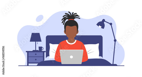 Young person working comfortably from bed on a laptop. Depicts remote work, freelancing, or studying from home, highlighting flexibility and modern lifestyle.